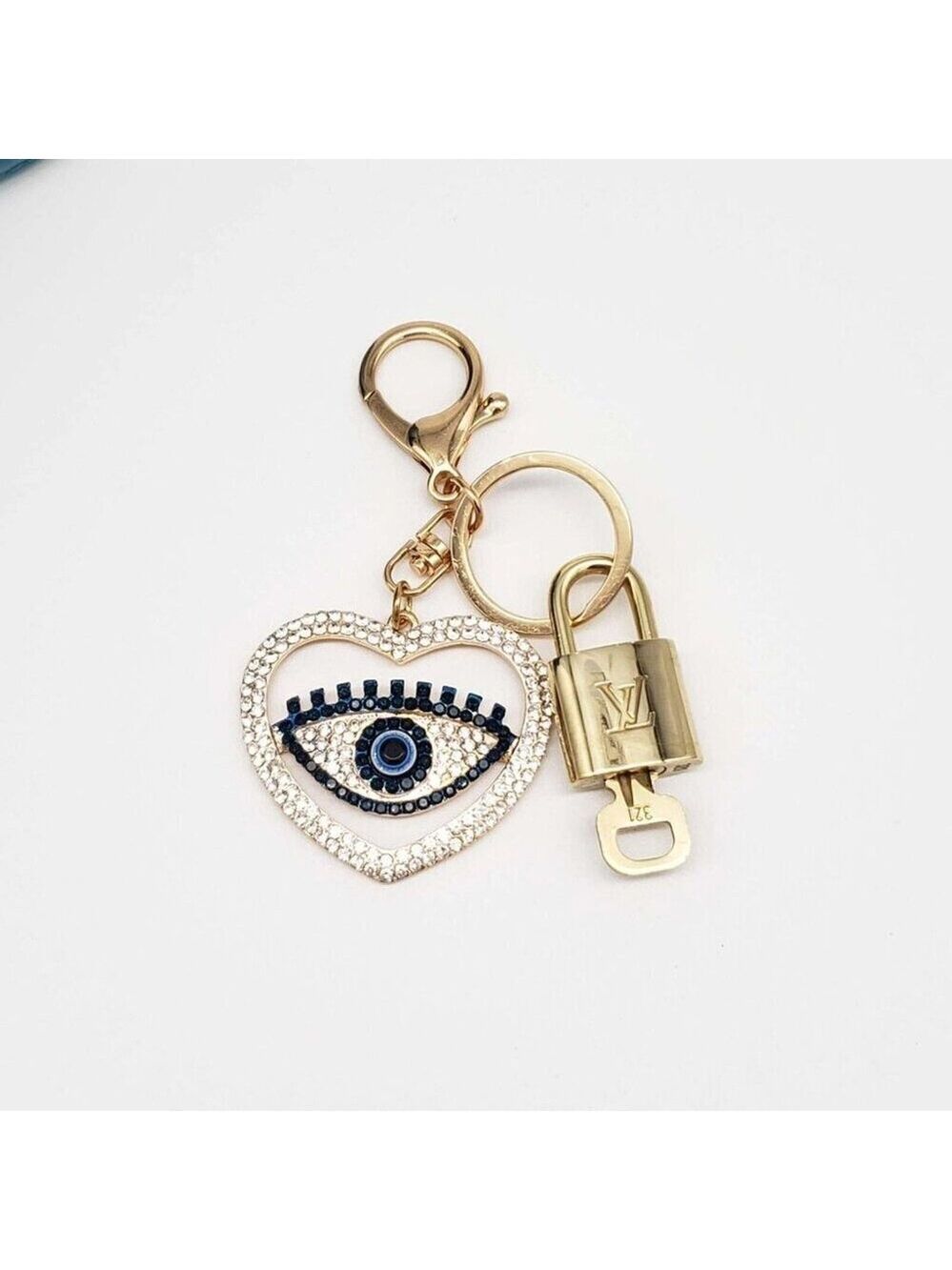 Authentic Louis Vuitton Lock & Key with unbranded Evil Eye Bagcharm, Keycharm